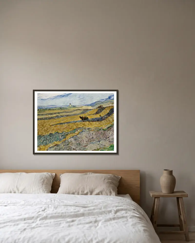 Enclosed Field with Ploughman av Vincent van Gogh inramad på en vägg