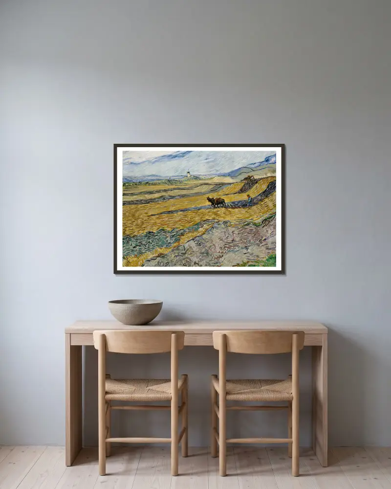 Enclosed Field with Ploughman av Vincent van Gogh inramad på en vägg