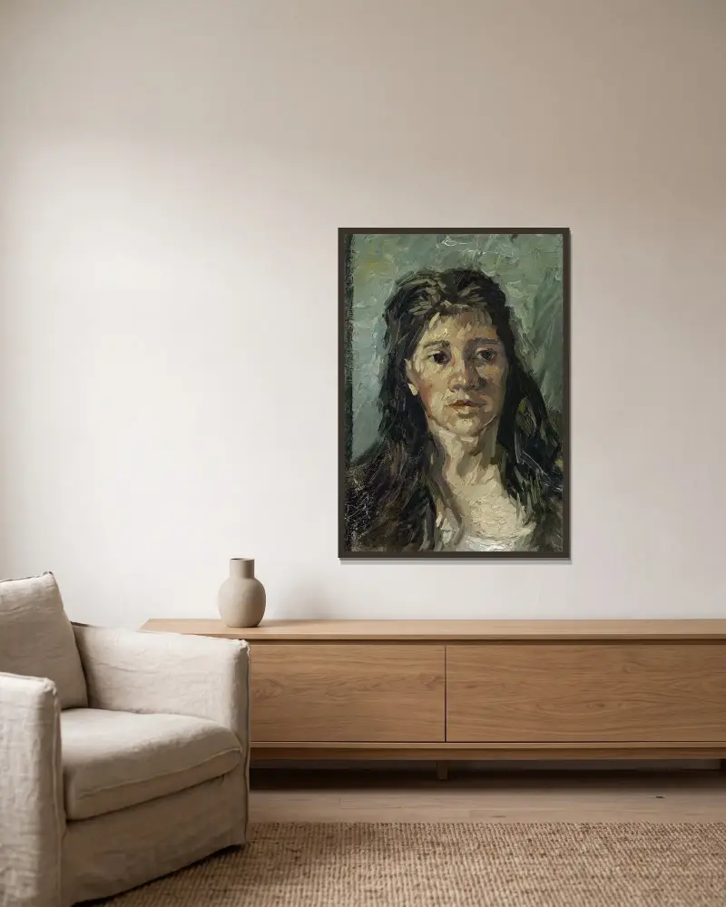 Head Of A Prostitute av Vincent van Gogh inramad på en vägg