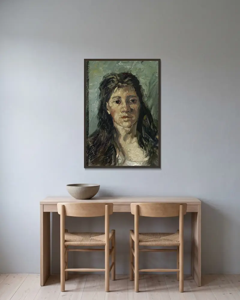 Head Of A Prostitute av Vincent van Gogh inramad på en vägg