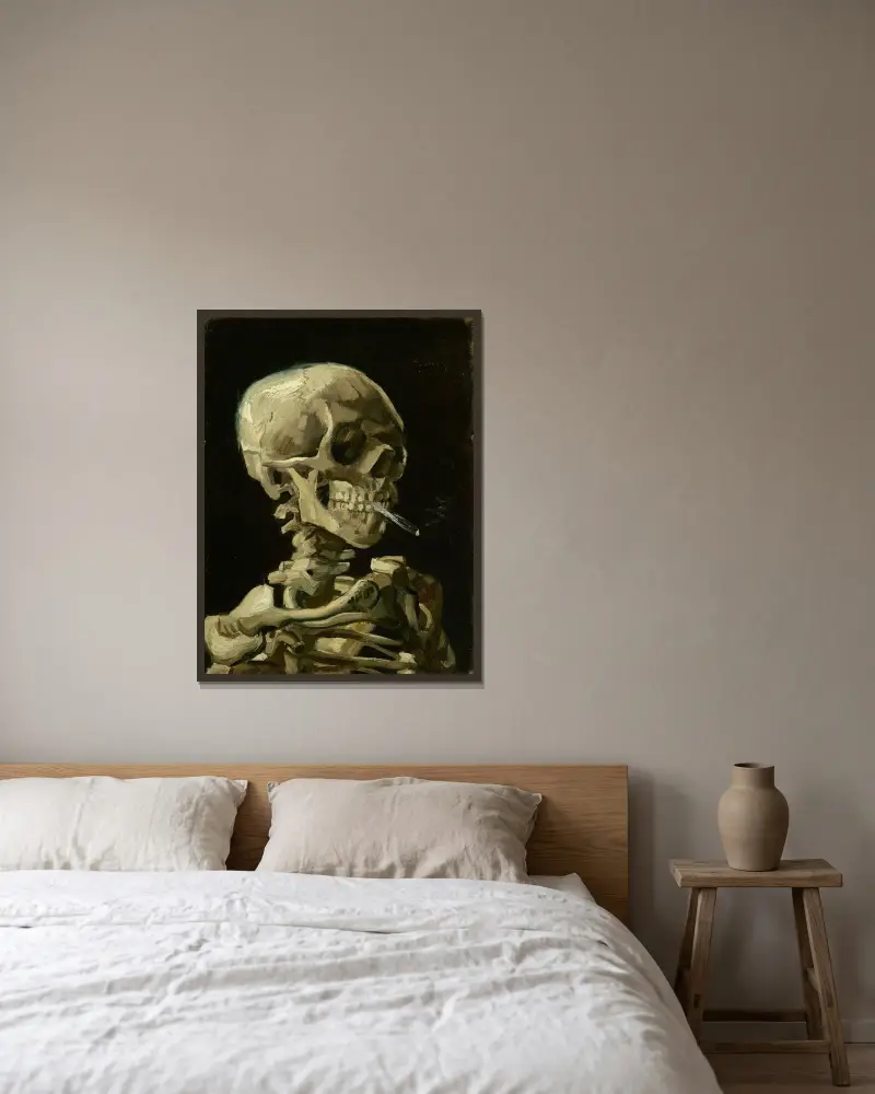 Head Of A Skeleton With A Burning Cigarette av Vincent van Gogh inramad på en vägg