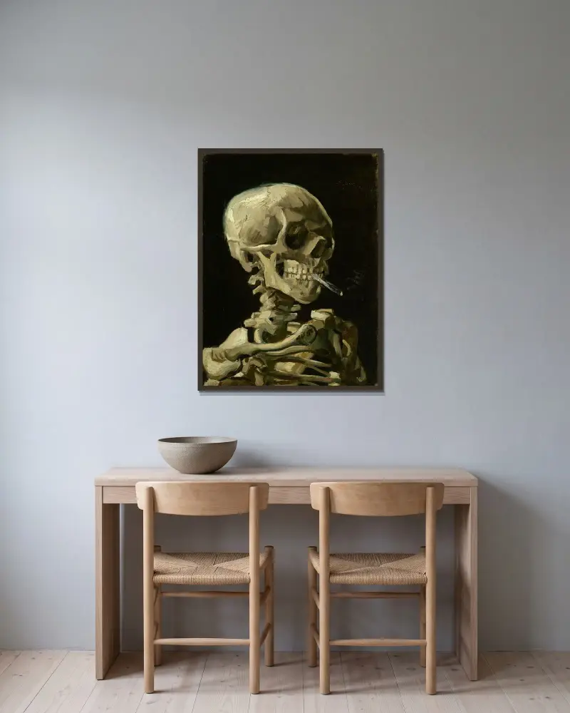 Head Of A Skeleton With A Burning Cigarette av Vincent van Gogh inramad på en vägg