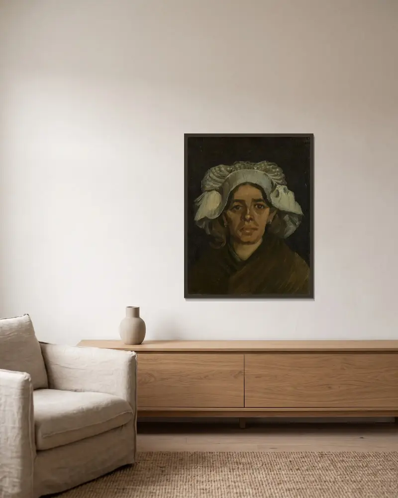 Kvinnehuvud 3 av Vincent van Gogh inramad på en vägg