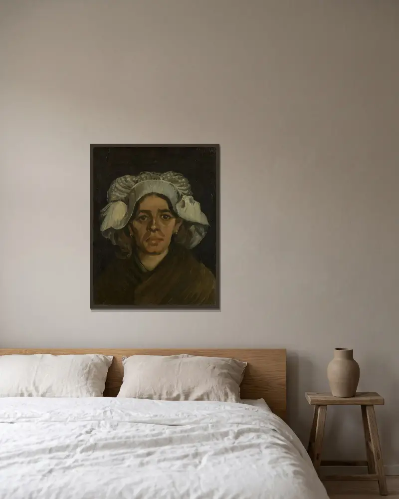 Kvinnehuvud 3 av Vincent van Gogh inramad på en vägg