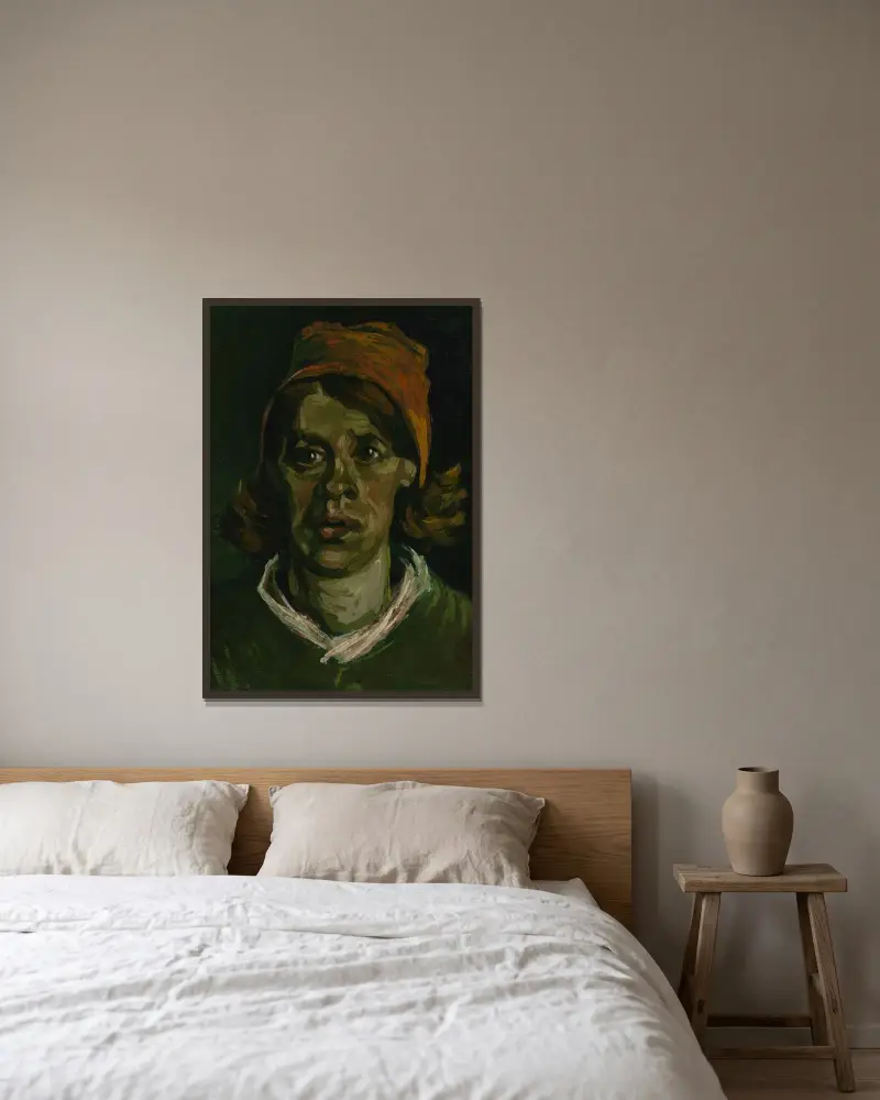 Kvinnehuvud av Vincent van Gogh inramad på en vägg