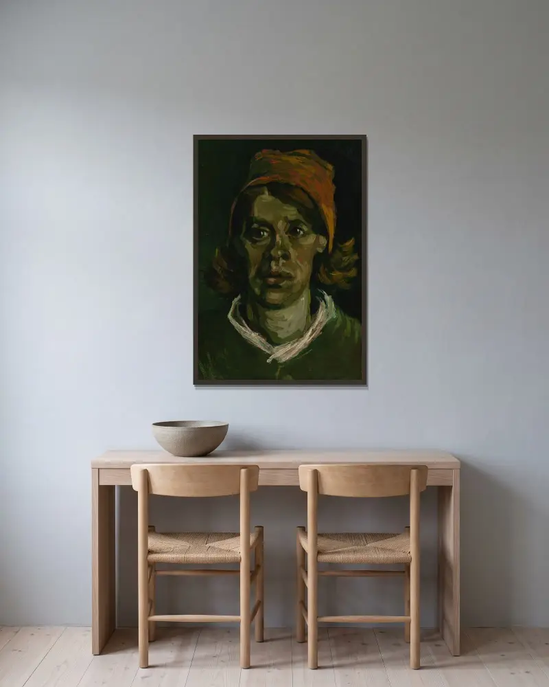 Kvinnehuvud av Vincent van Gogh inramad på en vägg