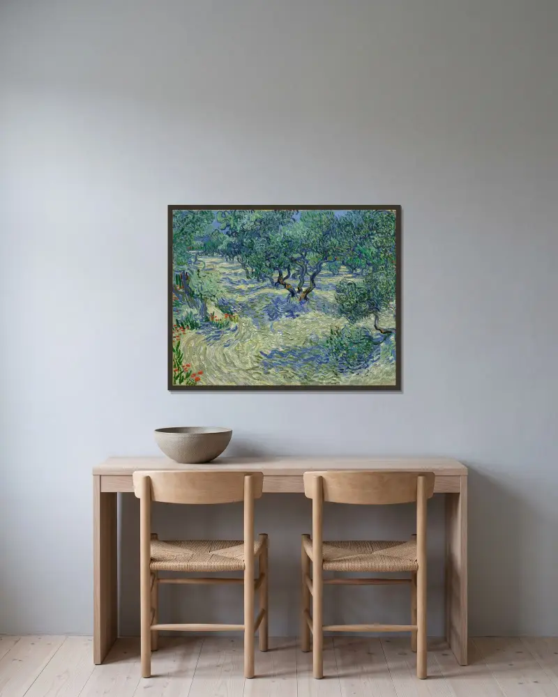 Olive Orchard av Vincent van Gogh inramad på en vägg