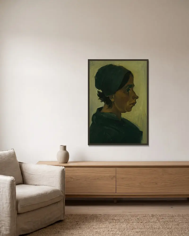 Peasant woman, head av Vincent van Gogh inramad på en vägg