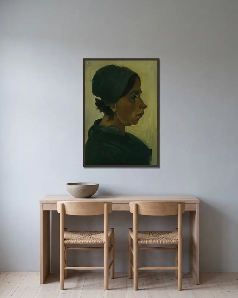 Peasant woman, head av Vincent van Gogh inramad på en vägg