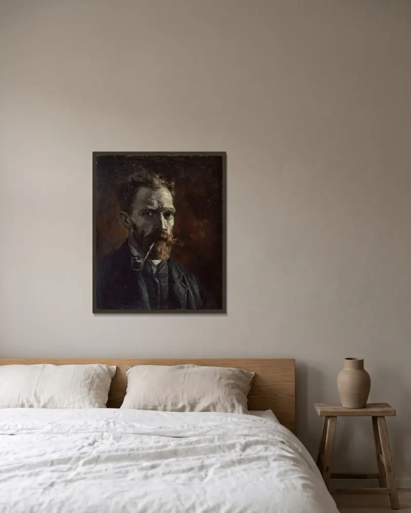Selbstbildnis mit Pfeife von Vincent van Gogh gerahmt an einer Wand