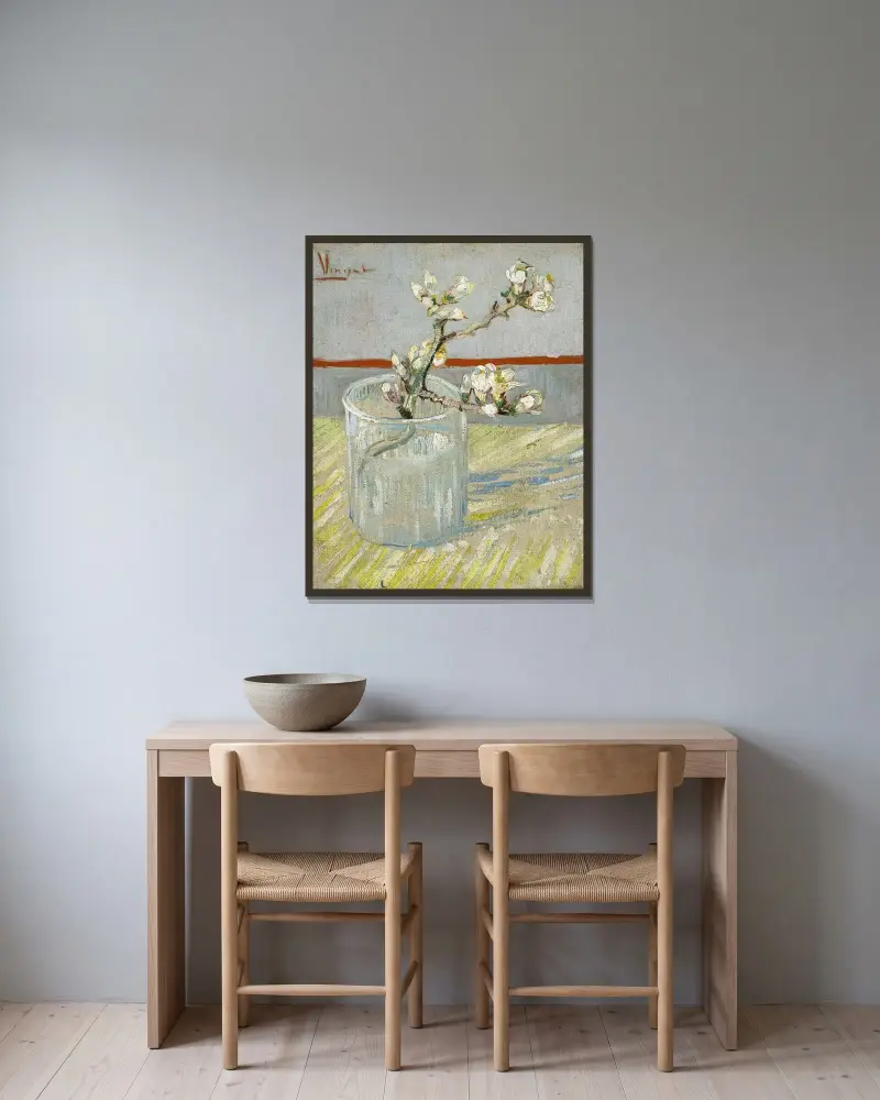 Sprig of flowering almond in a glass av Vincent van Gogh inramad på en vägg