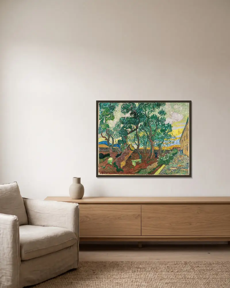 Trädgården vid Saint-Paul-sjukhuset av Vincent van Gogh inramad på en vägg