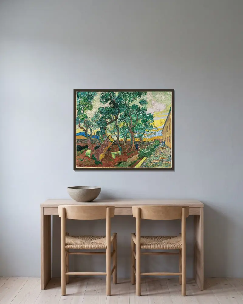 Trädgården vid Saint-Paul-sjukhuset av Vincent van Gogh inramad på en vägg
