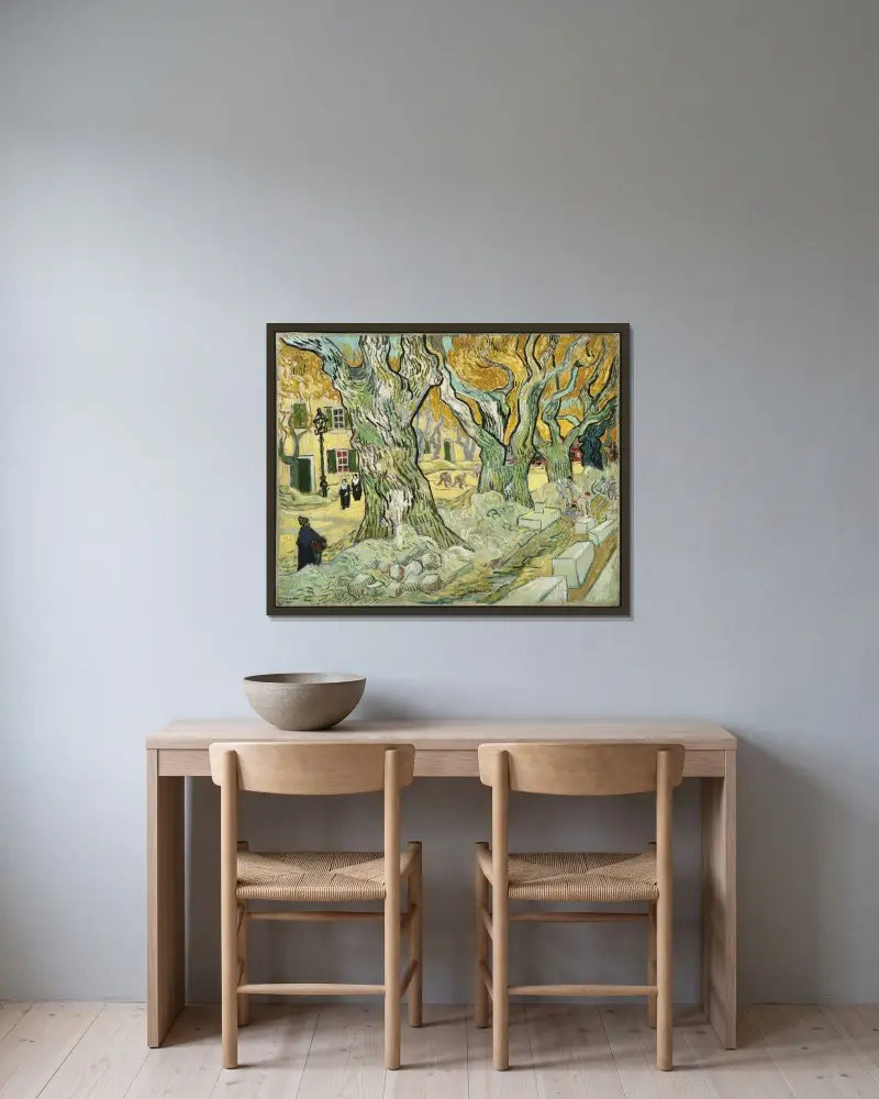 The Road Menders av Vincent van Gogh inramad på en vägg