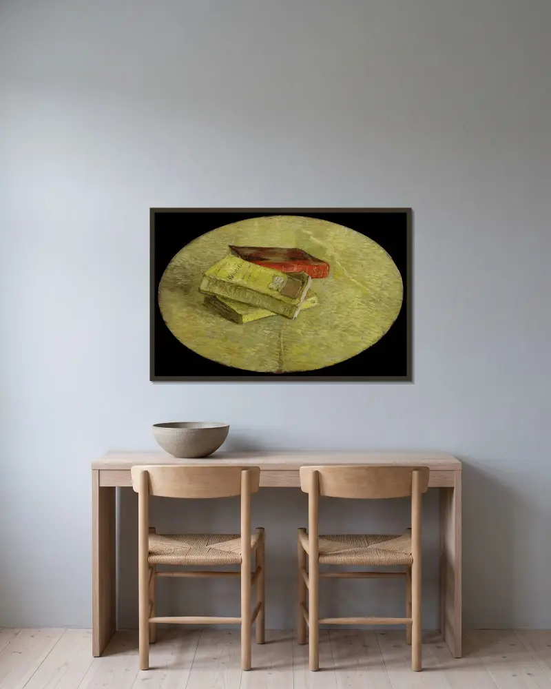 Three books av Vincent van Gogh inramad på en vägg