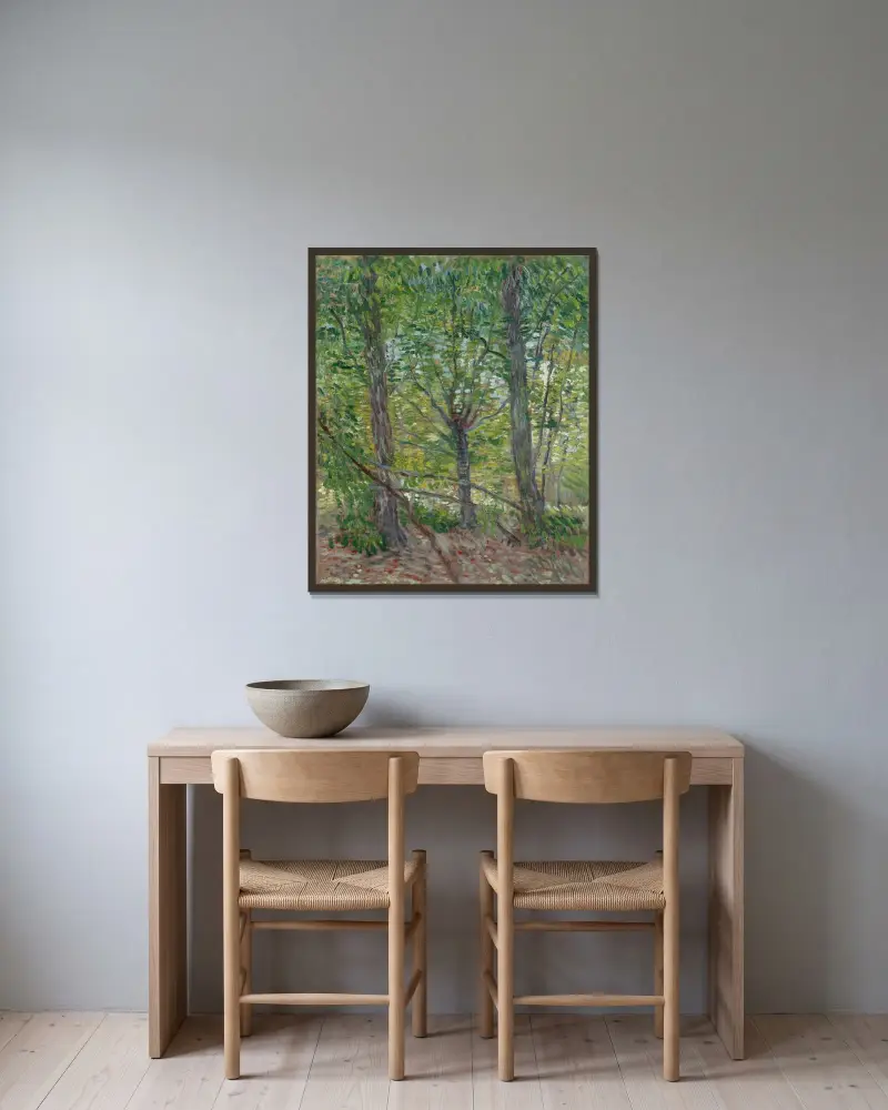 Trees av Vincent van Gogh inramad på en vägg