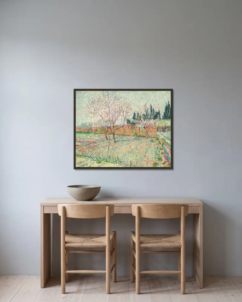 Verger avec cyprès av Vincent van Gogh inramad på en vägg