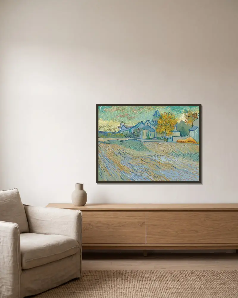 Blick auf das Asyl und die Kapelle Saint-Paul de Mausole (Saint-Rémy) von Vincent van Gogh gerahmt an einer Wand