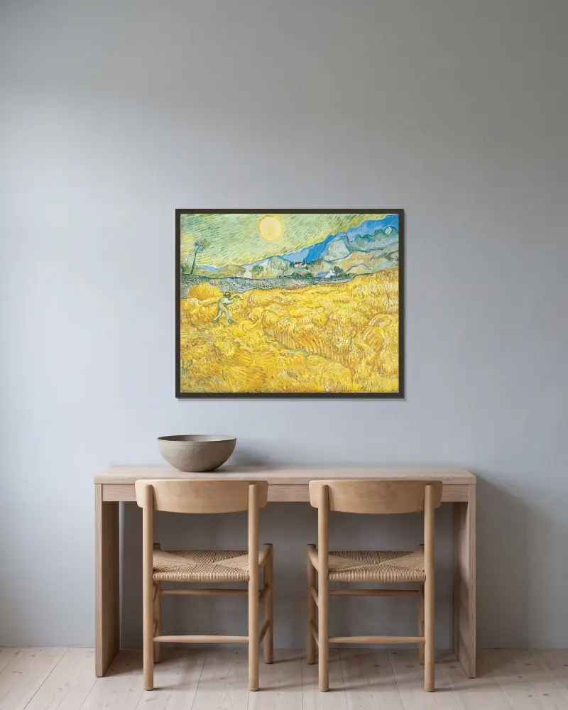 Wheat Field Behind Saint-Paul Hospital with a Reaper av Vincent van Gogh inramad på en vägg