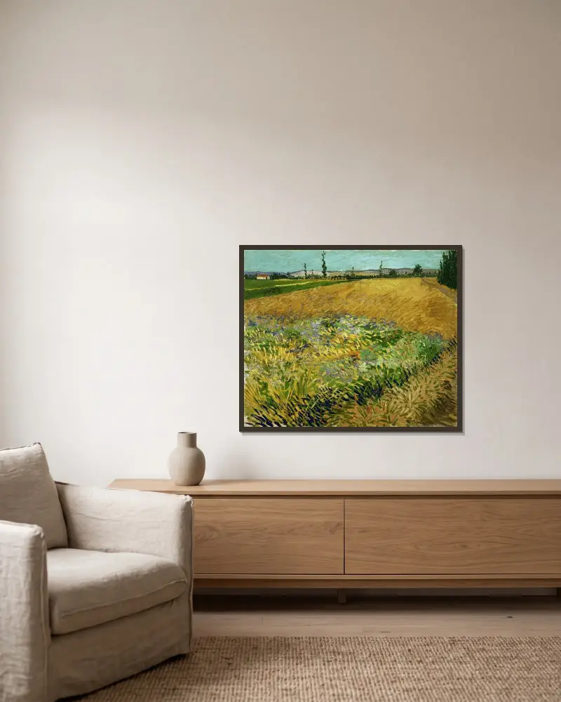 Wheatfield av Vincent van Gogh inramad på en vägg
