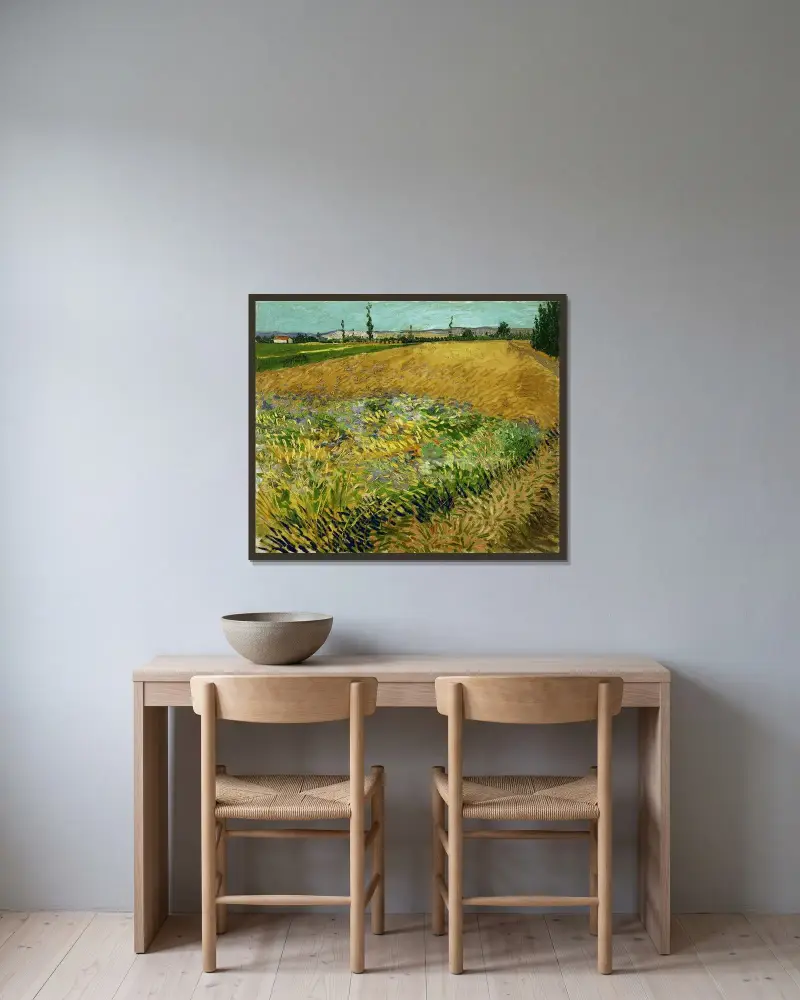 Wheatfield av Vincent van Gogh inramad på en vägg