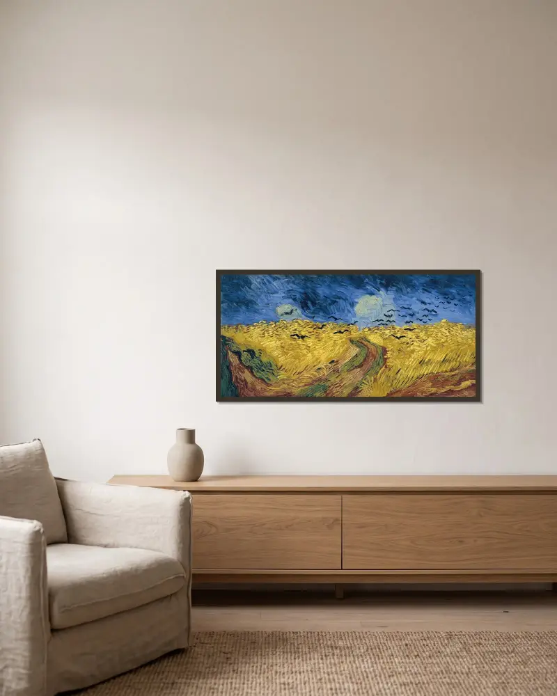 Vetefält med kråkor av Vincent van Gogh inramad på en vägg