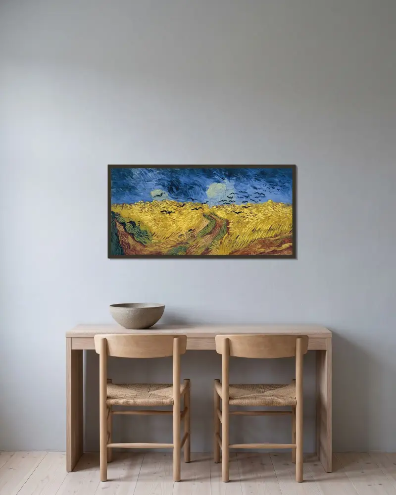 Vetefält med kråkor av Vincent van Gogh inramad på en vägg