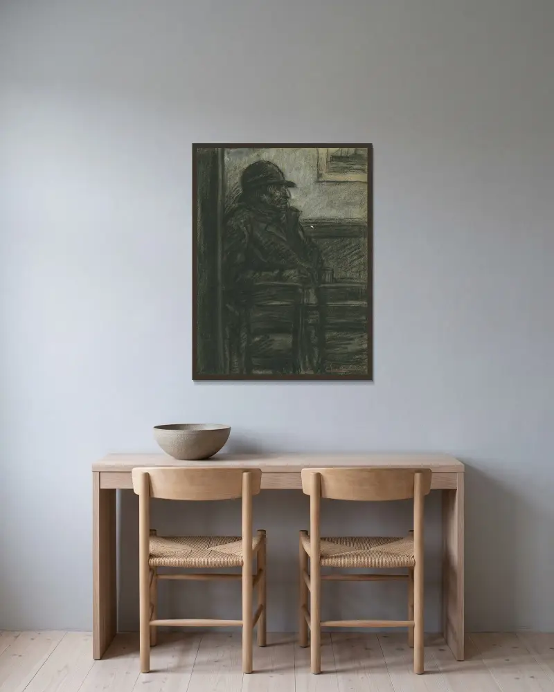 En gammal man som sitter på en stol av Eugeen Van Mieghem inramad på en vägg
