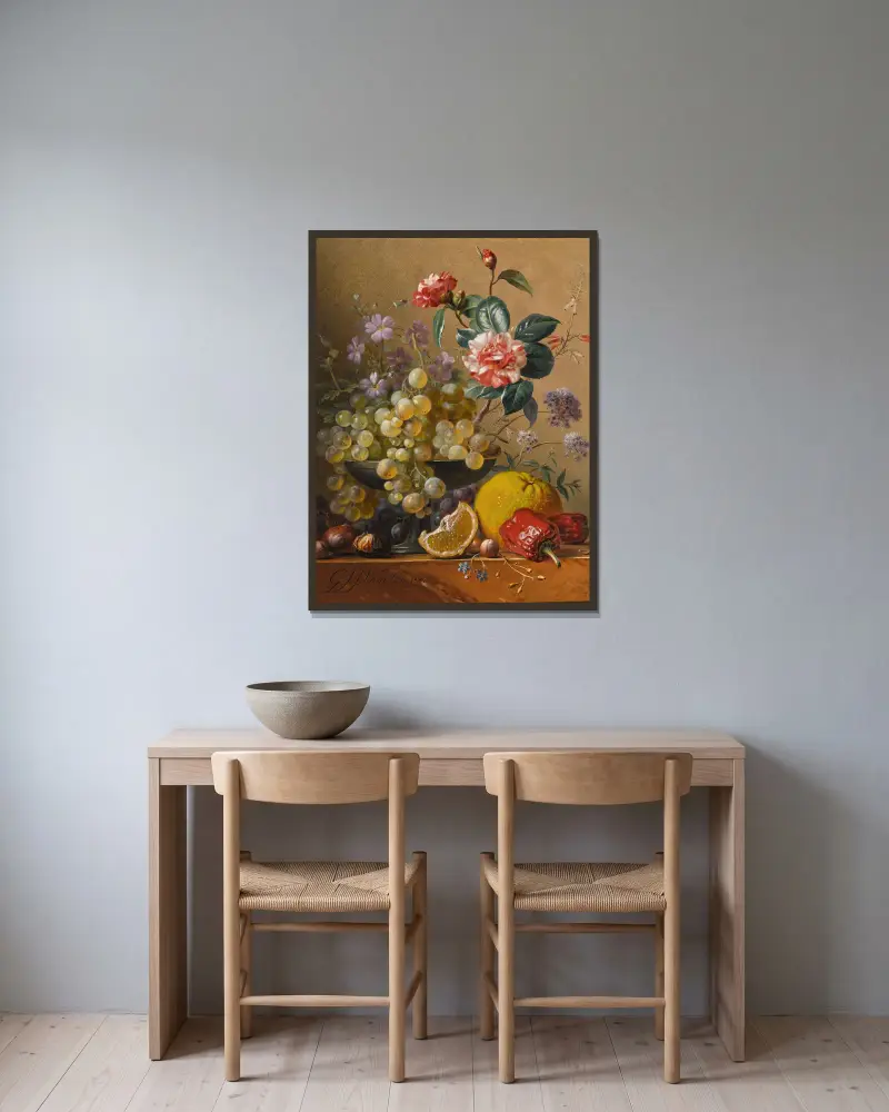 Still life with a camelia spray, cornflowers and grapes in a silver bowl, with nuts, an orange and red peppers, all on a marble ledge av Georgius Jacobus Johannes van Os inramad på en vägg