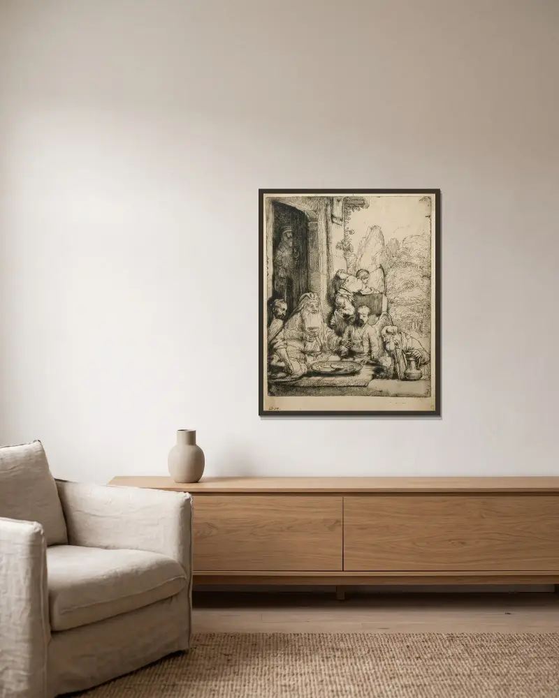 Abraham empfängt die Engel von Rembrandt van Rijn gerahmt an einer Wand