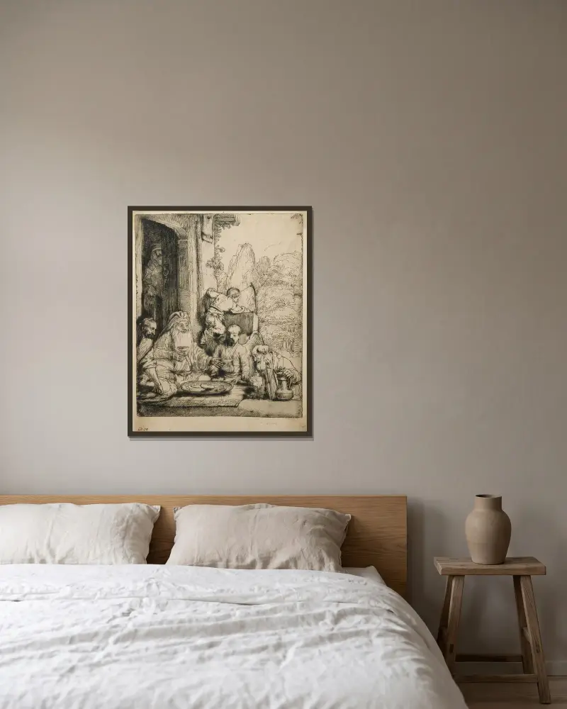 Abraham empfängt die Engel von Rembrandt van Rijn gerahmt an einer Wand
