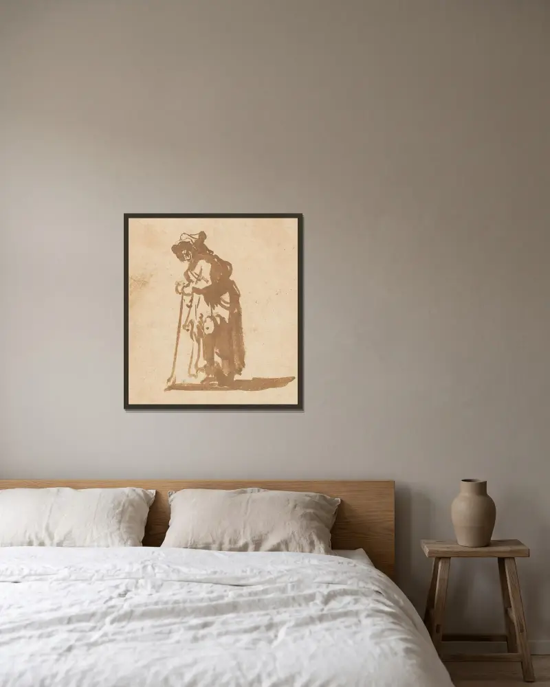 Tiggarkvinna lutad mot käpp av Rembrandt van Rijn inramad på en vägg