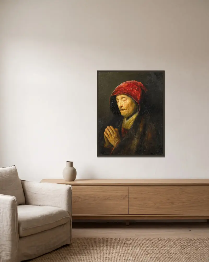 Stará žena v modlitbě, Rembrandt van Rijn v rámu na stěně
