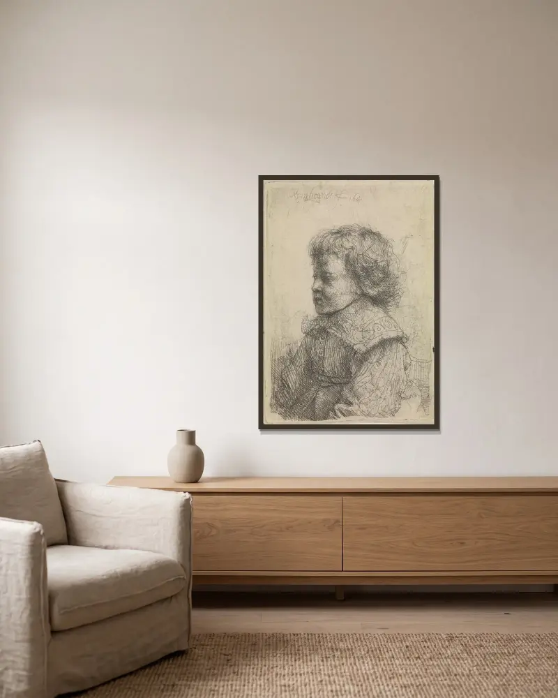 Bildnis eines Jungen im Profil von Rembrandt van Rijn gerahmt an einer Wand