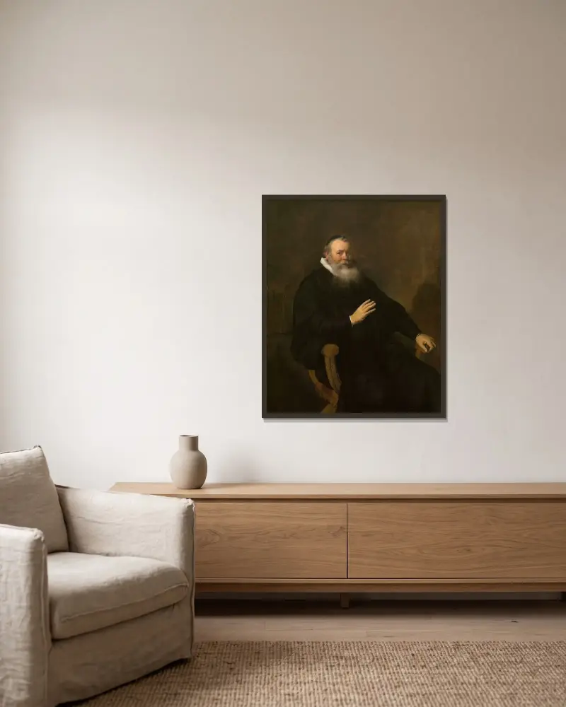 Porträt eines Geistlichen von Rembrandt van Rijn gerahmt an einer Wand