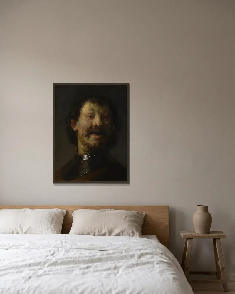 The Laughing Man av Rembrandt van Rijn inramad på en vägg