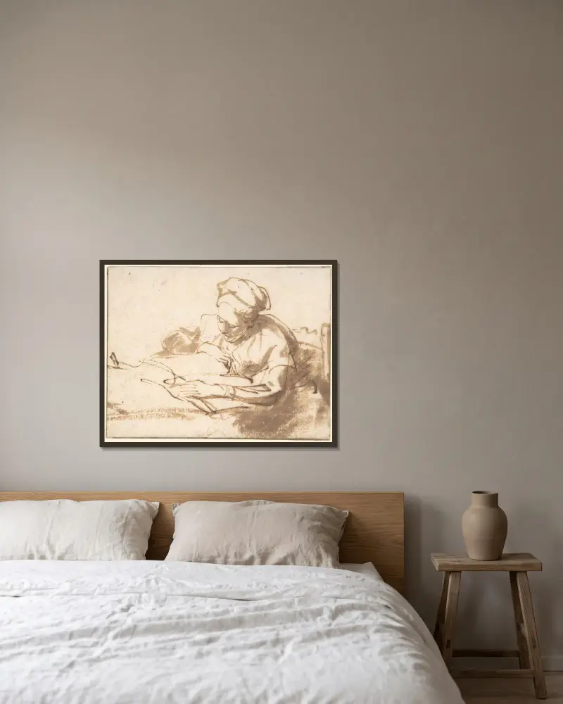 Woman Reading – nr 1 av Rembrandt van Rijn inramad på en vägg