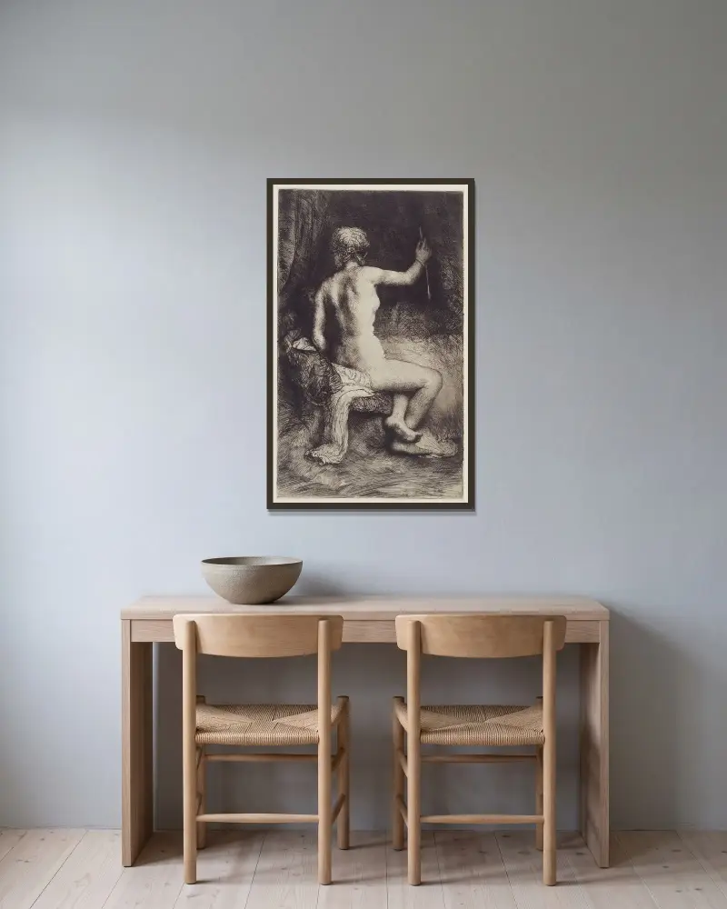 Frau mit dem Pfeil von Rembrandt van Rijn gerahmt an einer Wand