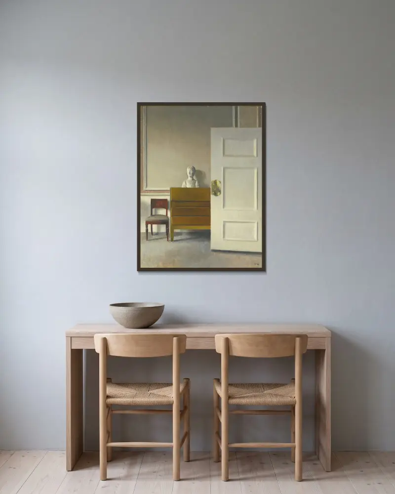 Interior with a bust av Vilhelm Hammershøi inramad på en vägg
