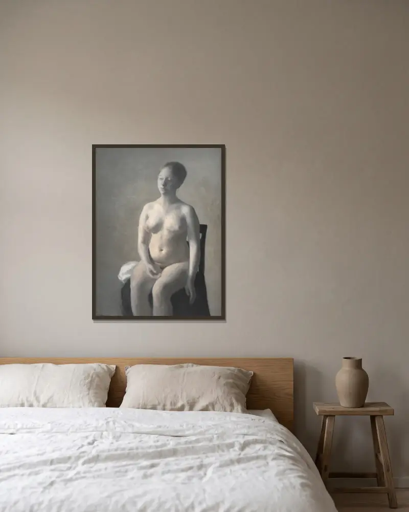 Seated Female Nude av Vilhelm Hammershøi inramad på en vägg