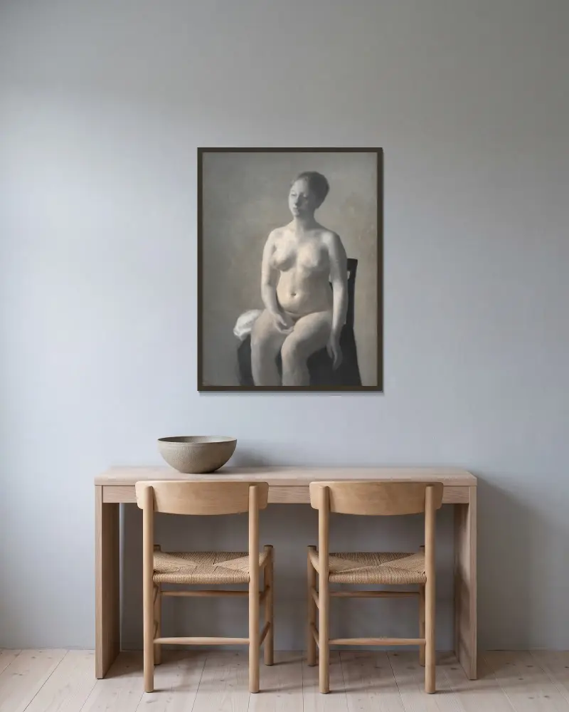 Seated Female Nude av Vilhelm Hammershøi inramad på en vägg