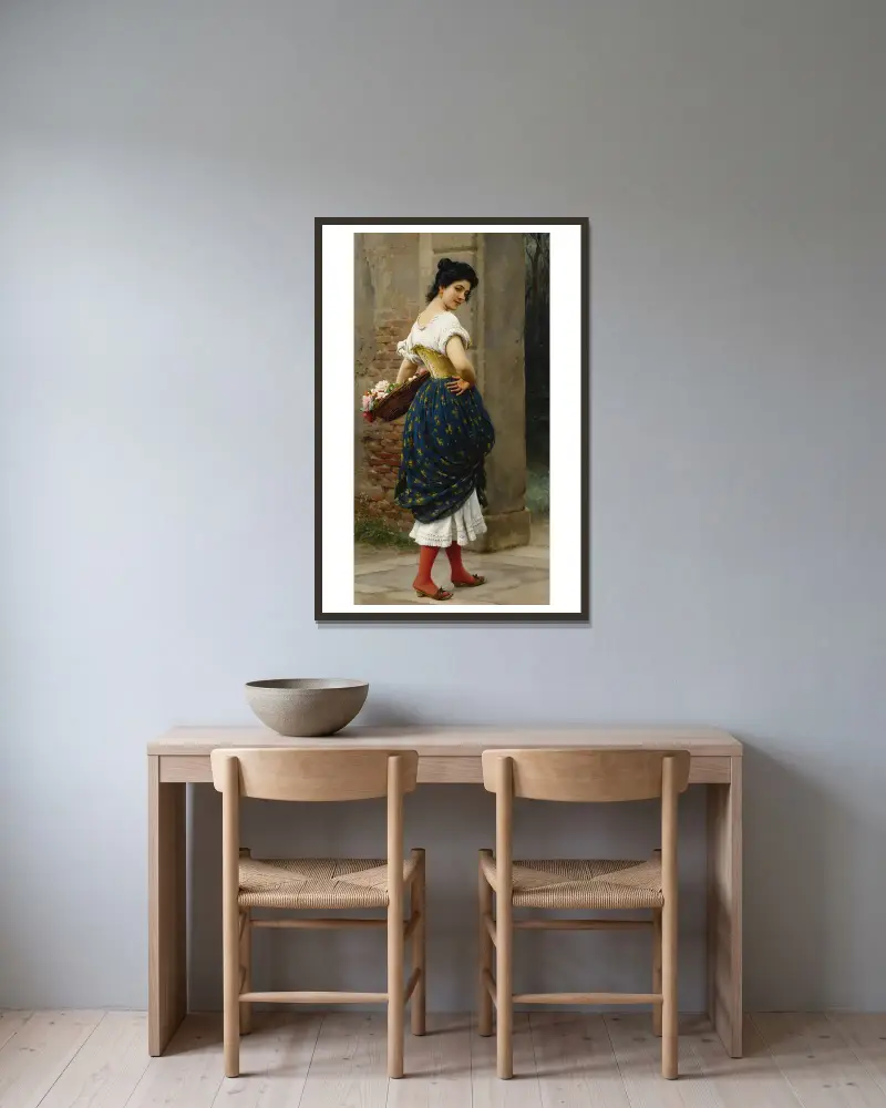 Ein junges Mädchen mit einem Rosenkorb von Eugen von Blaas gerahmt an einer Wand