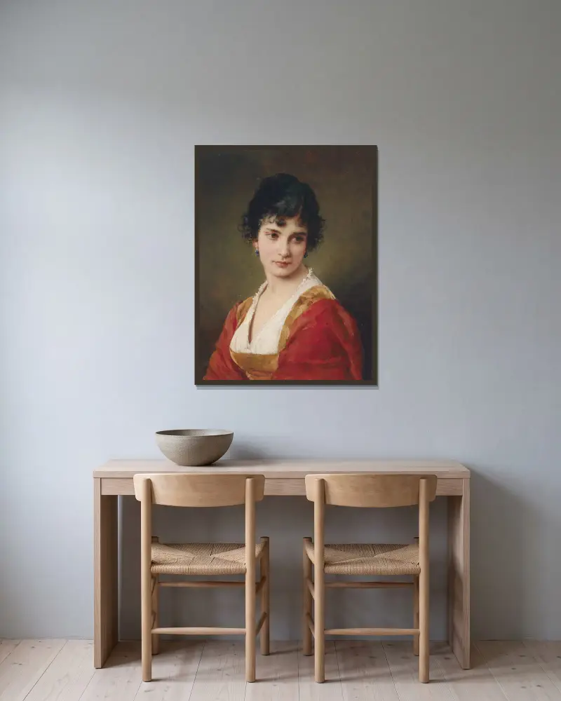 Porträtt av en ung kvinna av Eugen von Blaas inramad på en vägg