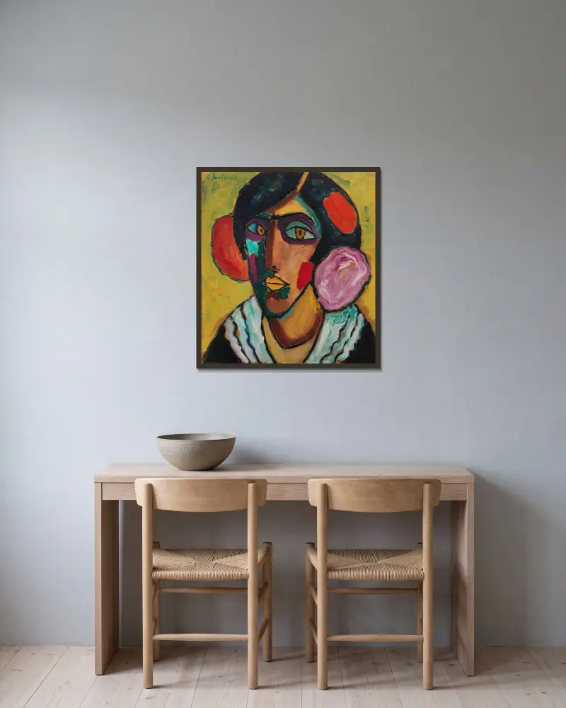Frauenkopf mit Blumen im Haar von Alexej von Jawlensky gerahmt an einer Wand