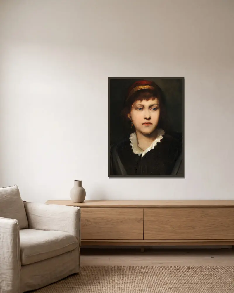 Porträtt av en flicka med huva och örhängen av Gabriel von Max inramad på en vägg