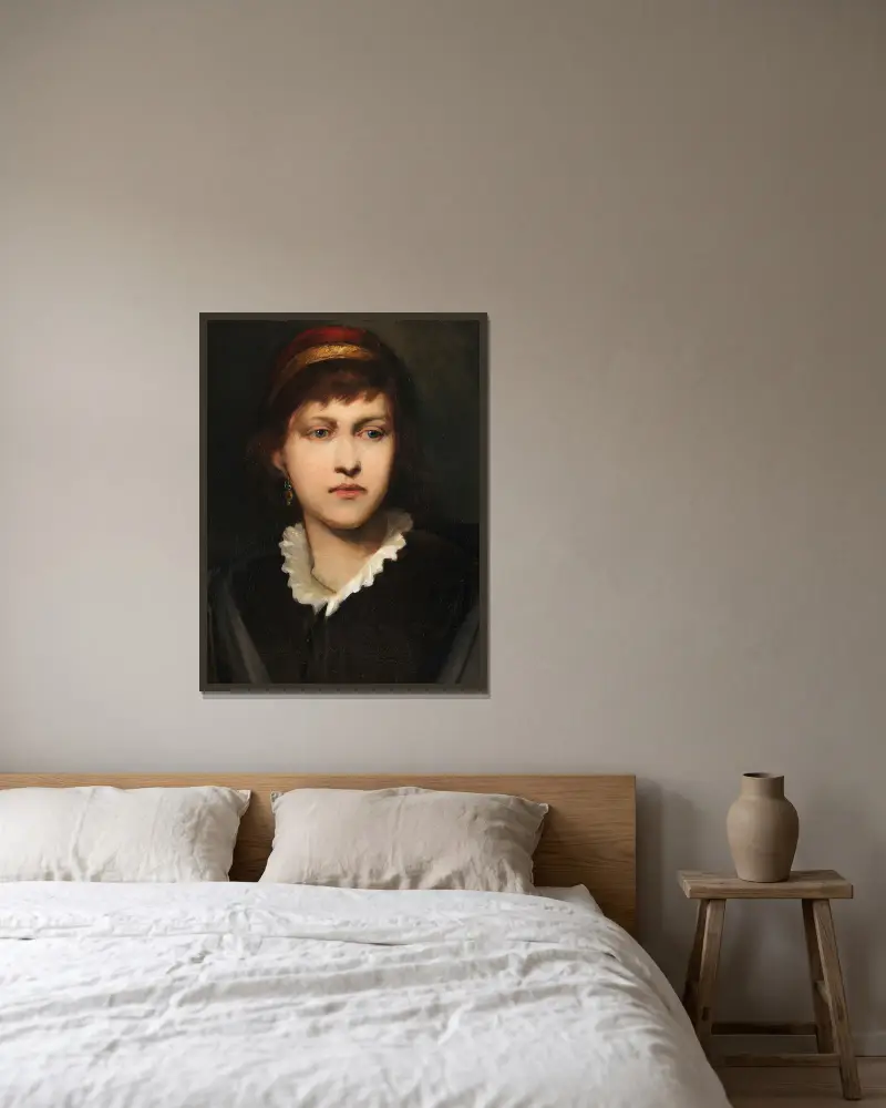 Porträtt av en flicka med huva och örhängen av Gabriel von Max inramad på en vägg