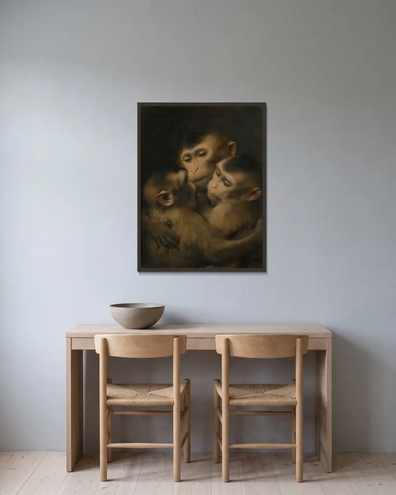Three Monkeys av Gabriel von Max inramad på en vägg