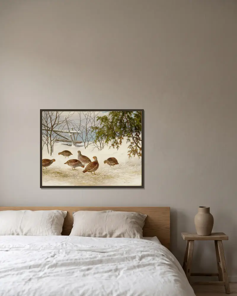 Partridges In Snow av Ferdinand von Wright inramad på en vägg