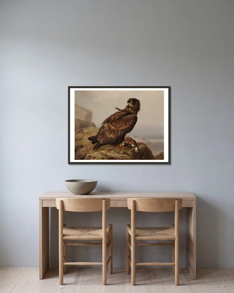 Seeadler mit Beute von Ferdinand von Wright gerahmt an einer Wand