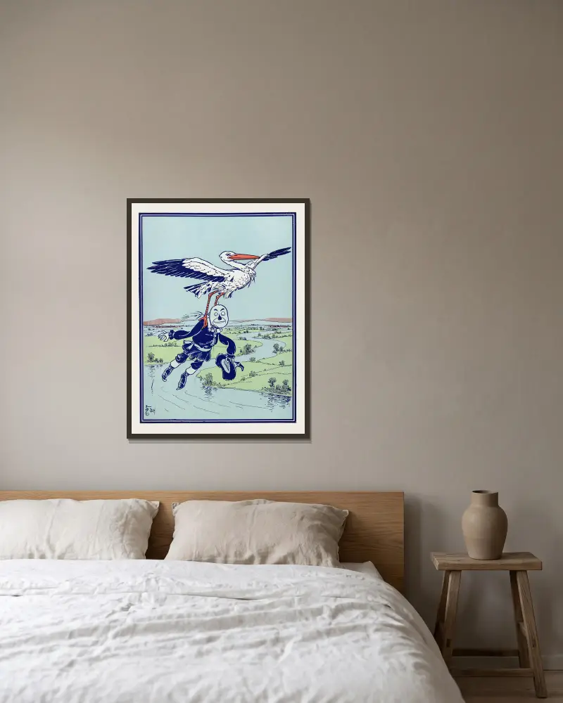 Der Storch trug ihn in die Lüfte von William Wallace Denslow gerahmt an einer Wand